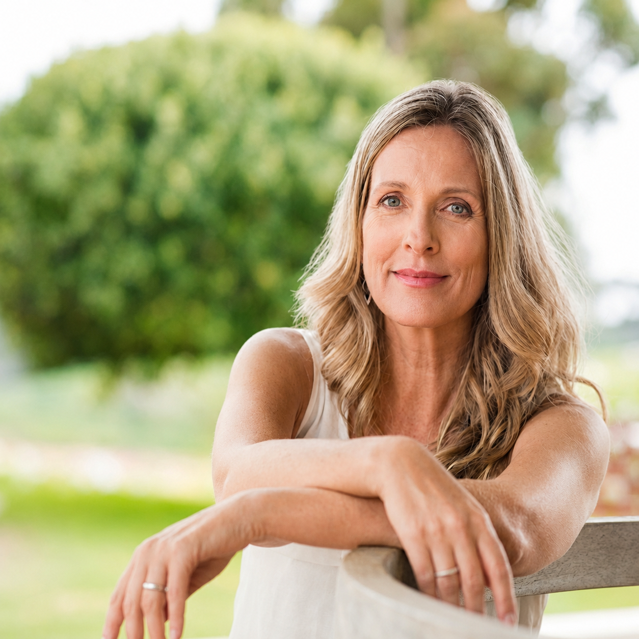 Woman in Oklahoma learning about hormone therapy for women and personalized hormone health treatment options.